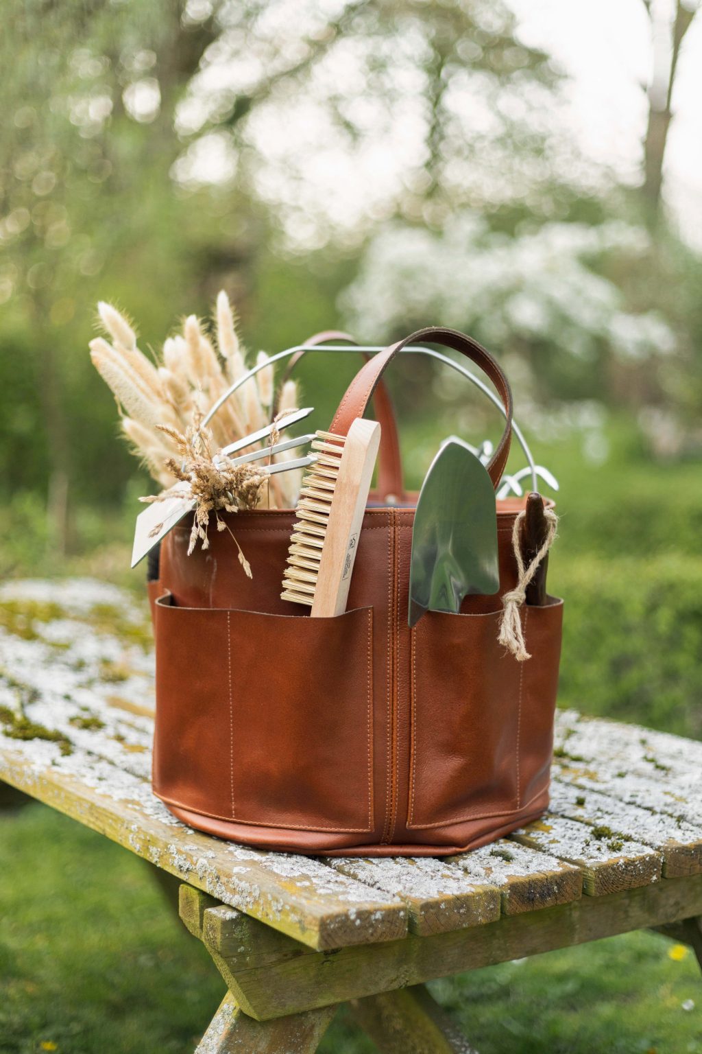 Bolster & Benefield leather tool bucket. Harvest Basket for carrying and storage in garden, workshop, atelier, or studio.