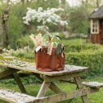 Bolster & Benefield leather tool bucket. Harvest Basket for carrying and storage in garden, workshop, atelier, or studio.