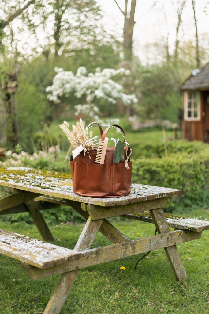 Bolster & Benefield leather tool bucket. Harvest Basket for carrying and storage in garden, workshop, atelier, or studio.