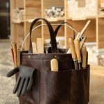 Bolster & Benefield leather tool bucket. Harvest Basket for carrying and storage in garden, workshop, atelier, or studio.