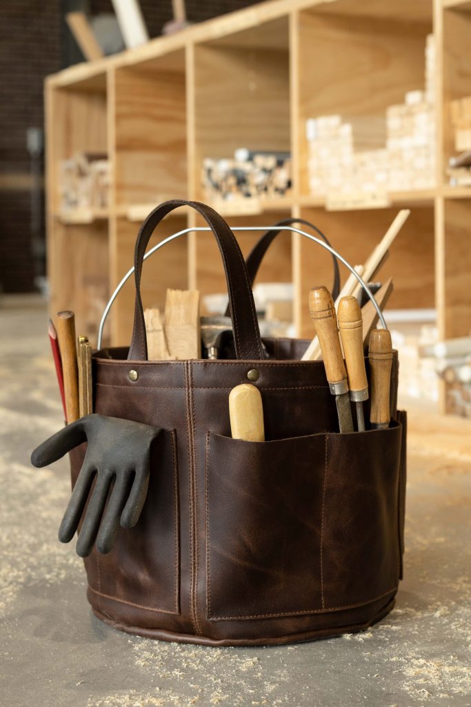 Bolster & Benefield leather tool bucket. Harvest Basket for carrying and storage in garden, workshop, atelier, or studio.